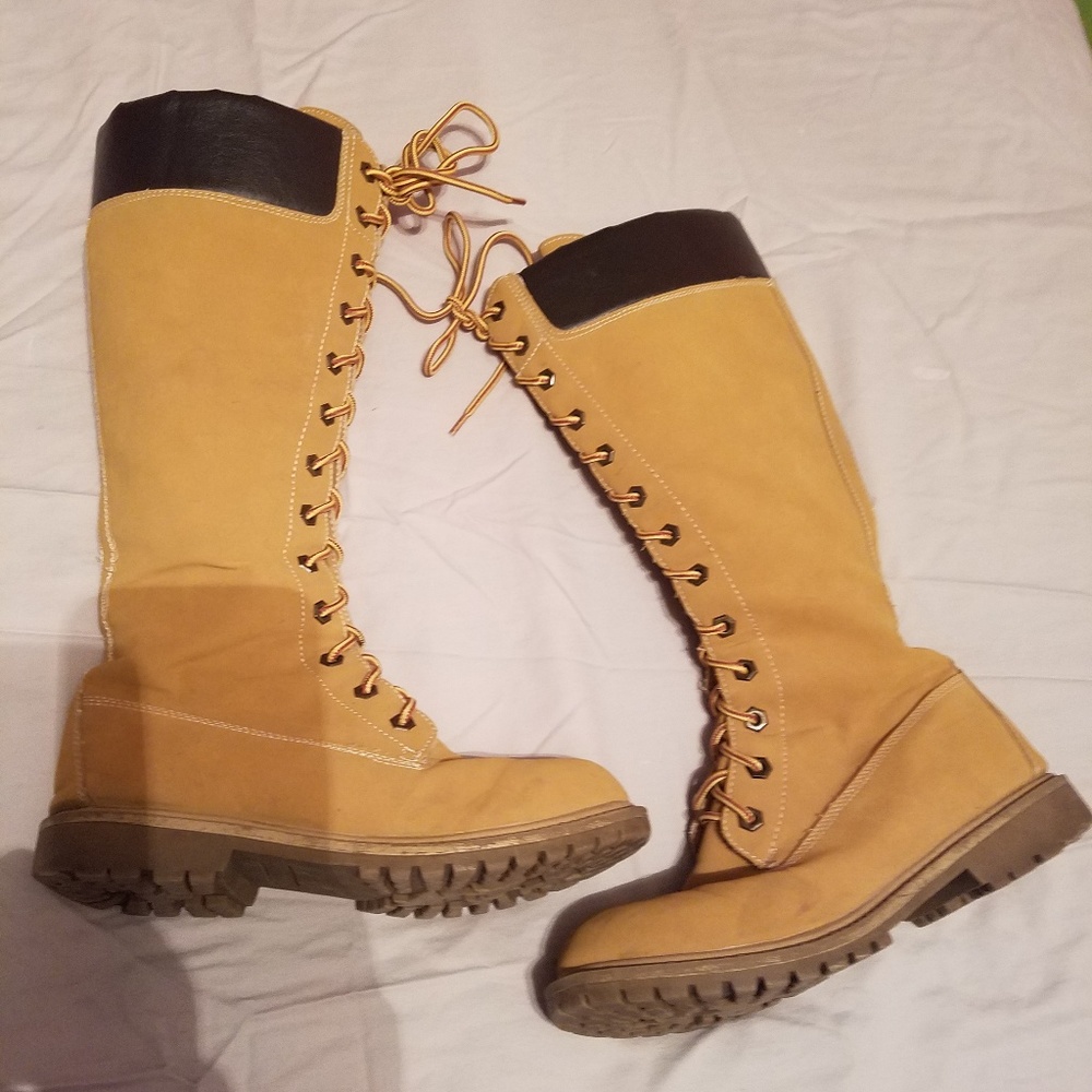 Tall lace up boots